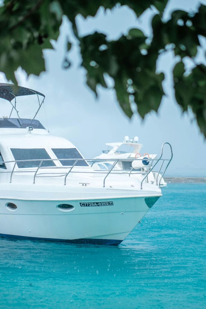 A luxurious yacht anchored in pristine blue waters, ideal for summer travel and adventure.